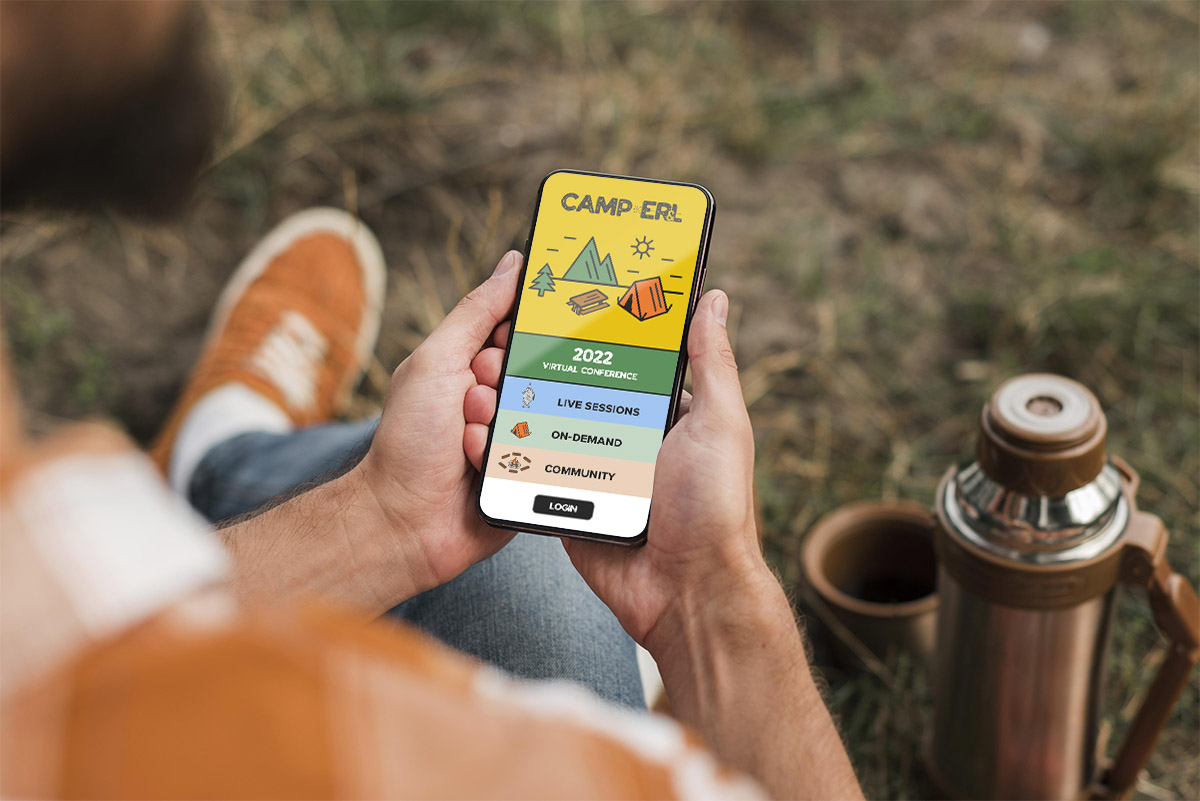 individual using mobile phone to see virtual conference while outdoors